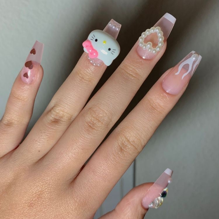 Pink hello kitty nails